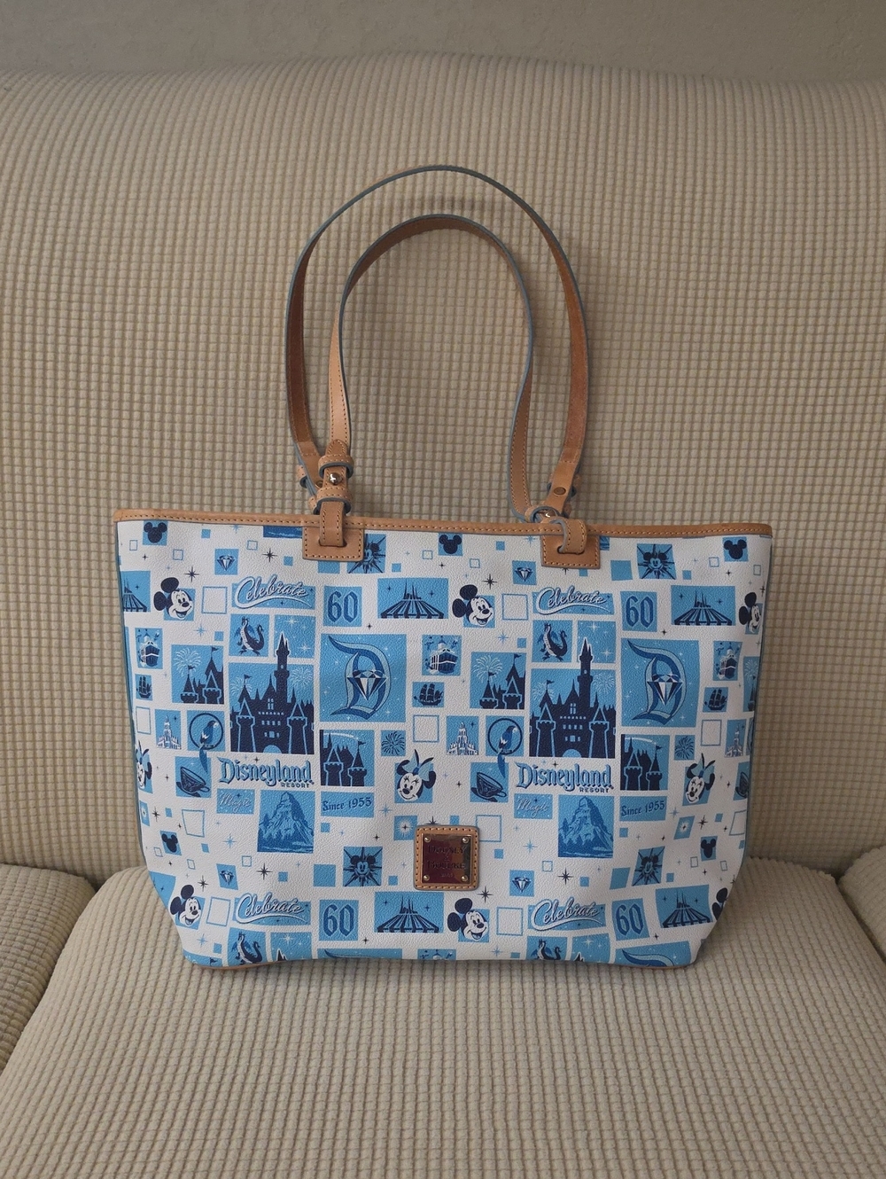 Dooney & Bourke Blue and White Disneyland Print Tote with Tan Leather Straps